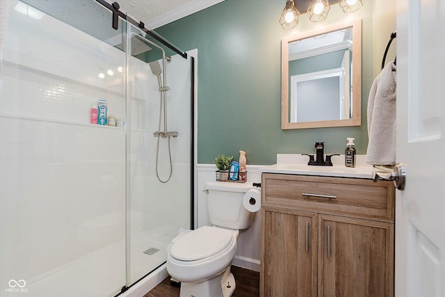 2824 E 150 S, Tipton, IN 46072 - bathroom with vanity, a shower stall, wood finished floors, and ornamental molding