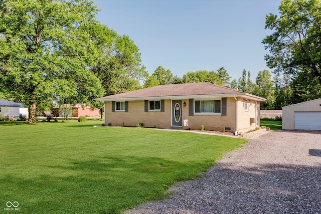 2824 E 150 S, Tipton, IN 46072 - single story home with an outbuilding, a front lawn, brick siding, driveway, and roof with shingles