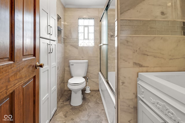 2400 Walnut St, Anderson, IN 46016 - bathroom with tile walls, combined bath / shower with glass door, vanity, and ornamental molding