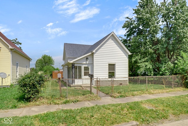 2400 Walnut St, Anderson, IN 46016 - view of front of house featuring roof with shingles