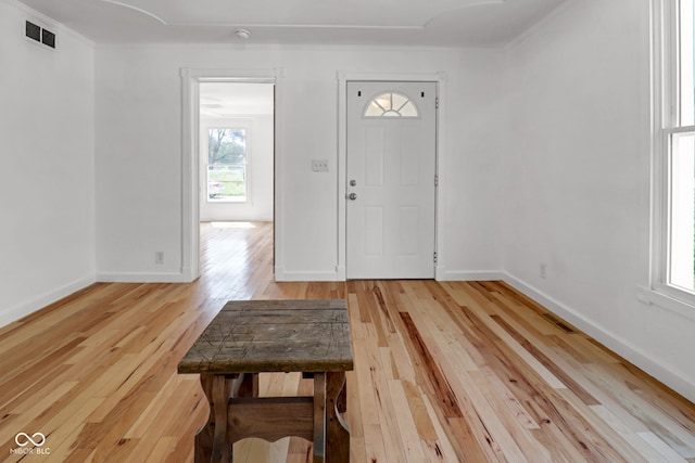 2400 Walnut St, Anderson, IN 46016 - entryway featuring light wood-style flooring and baseboards