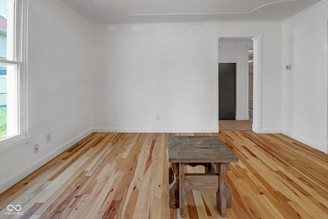 2400 Walnut St, Anderson, IN 46016 - spare room featuring wood-type flooring and baseboards
