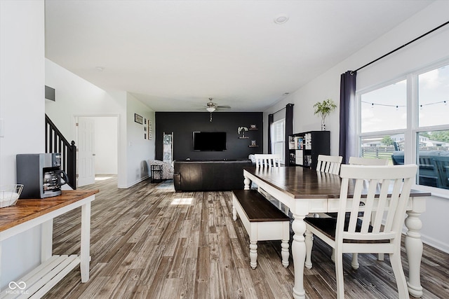 1461 Bigleaf Dr, Sheridan, IN 46069 - dining room with wood finished floors, plenty of natural light, ceiling fan, and stairs