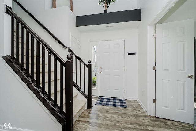 1461 Bigleaf Dr, Sheridan, IN 46069 - foyer with wood finished floors, stairway, and a high ceiling