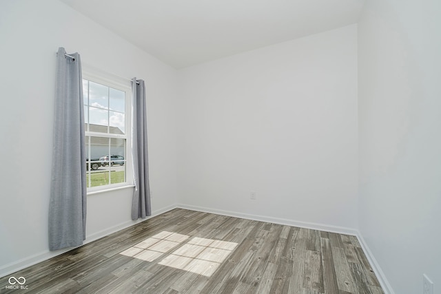 1461 Bigleaf Dr, Sheridan, IN 46069 - unfurnished room with wood finished floors and baseboards