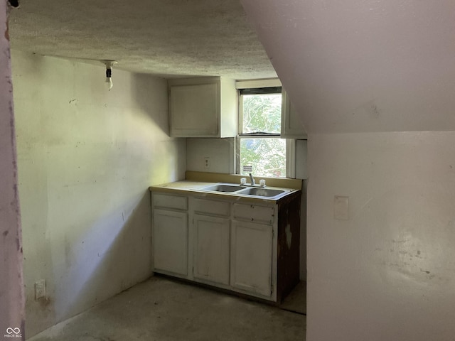 1367 Mulberry St, Noblesville, IN 46060 - kitchen with white cabinets, a textured ceiling, and light countertops