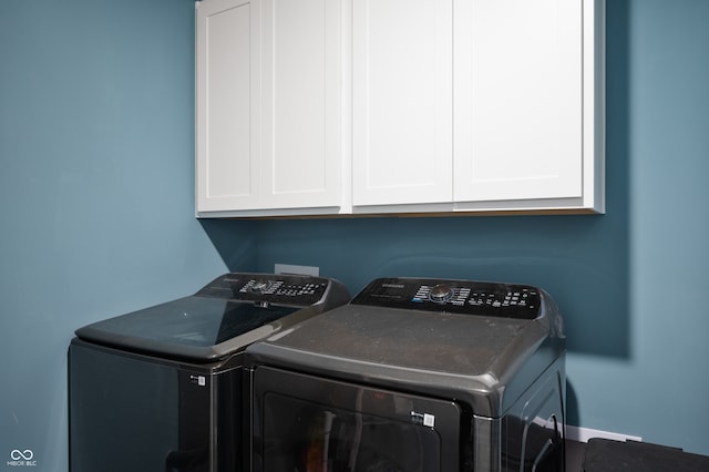 77 Winding Brook Way, Pendleton, IN 46064 - washroom featuring washer and dryer and cabinet space