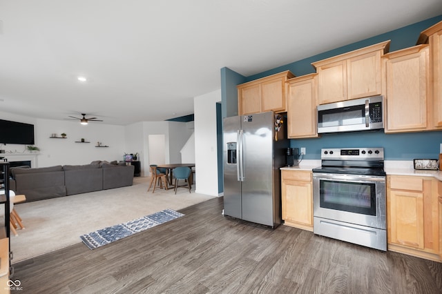 77 Winding Brook Way, Pendleton, IN 46064 - kitchen featuring appliances with stainless steel finishes, light brown cabinets, ceiling fan, wood finished floors, and light countertops