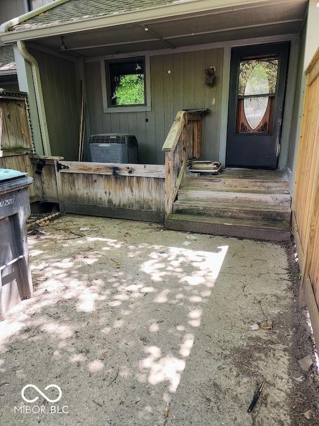 4235 Foxglove Trce, Indianapolis, IN 46237 - doorway to property featuring roof with shingles