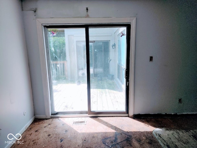 4235 Foxglove Trce, Indianapolis, IN 46237 - doorway to outside featuring baseboards