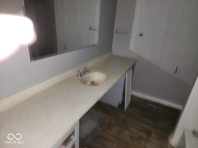 4235 Foxglove Trce, Indianapolis, IN 46237 - bathroom with wood finished floors and vanity