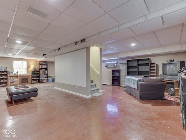 1225 Berrywood Dr, Greenwood, IN 46143 - living room featuring concrete flooring, stairway, a drop ceiling, and recessed lighting