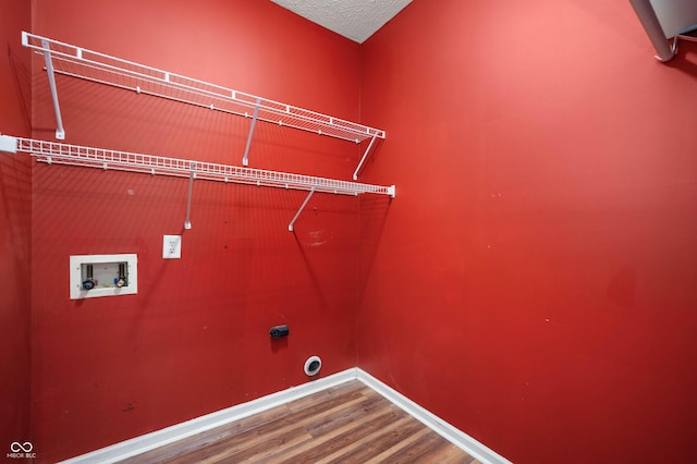 8578 Nolan Dr, Fishers, IN 46038 - laundry room featuring wood finished floors, washer hookup, and electric dryer hookup