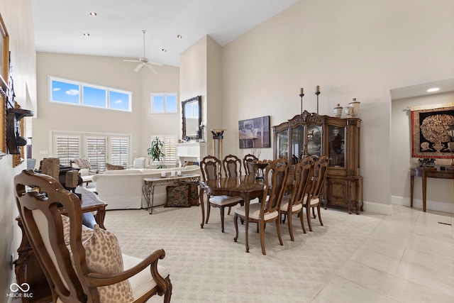 8164 Dean Rd, Indianapolis, IN 46240 - dining space featuring high vaulted ceiling, a ceiling fan, recessed lighting, and light tile patterned floors