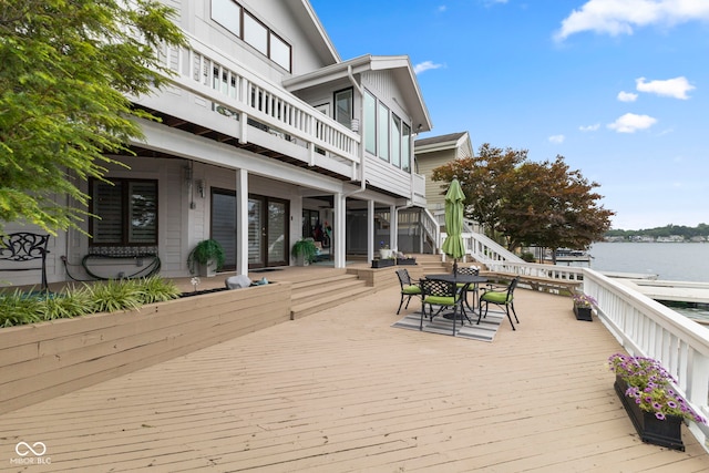8164 Dean Rd, Indianapolis, IN 46240 - wooden terrace featuring a water view and outdoor dining area