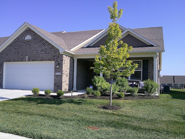 8804 Faulkner Dr, Indianapolis, IN 46239 - single story home featuring brick siding, a front yard, a garage, concrete driveway, and roof with shingles