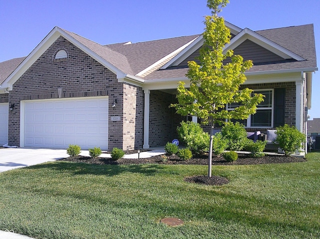 8804 Faulkner Dr, Indianapolis, IN 46239 - ranch-style home featuring brick siding, an attached garage, a front yard, and roof with shingles
