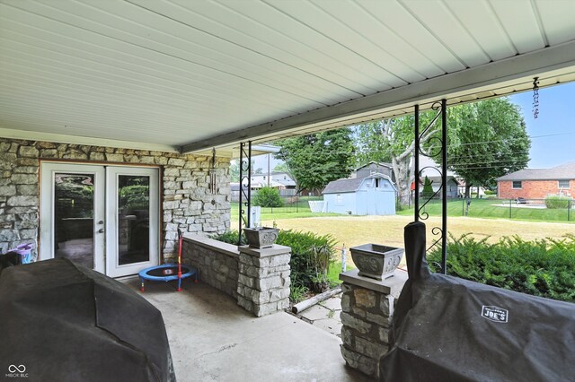 8219 Bishops Ln, Indianapolis, IN 46217 - view of patio / terrace with an outbuilding