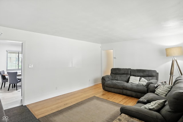 8219 Bishops Ln, Indianapolis, IN 46217 - living area with light wood-type flooring and baseboards
