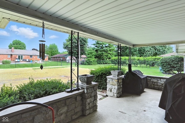 8219 Bishops Ln, Indianapolis, IN 46217 - fenced backyard with a patio and grilling area