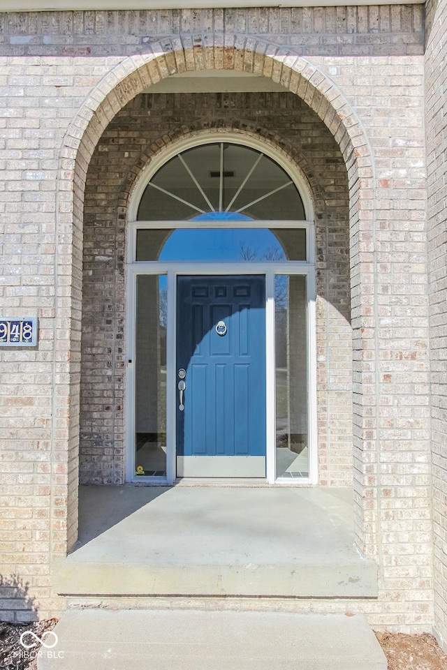 3948 S Woodfield Dr, New Palestine, IN 46163 - doorway to property with brick siding