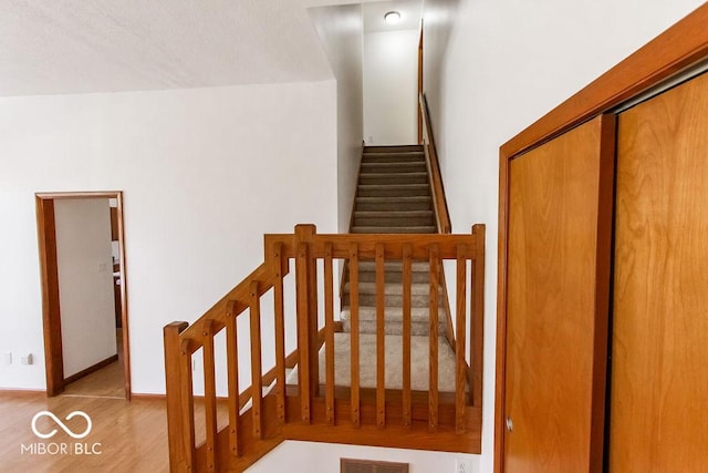 3948 S Woodfield Dr, New Palestine, IN 46163 - stairway with wood finished floors