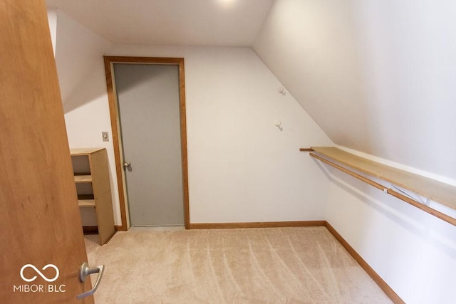 3948 S Woodfield Dr, New Palestine, IN 46163 - spacious closet featuring light colored carpet and vaulted ceiling