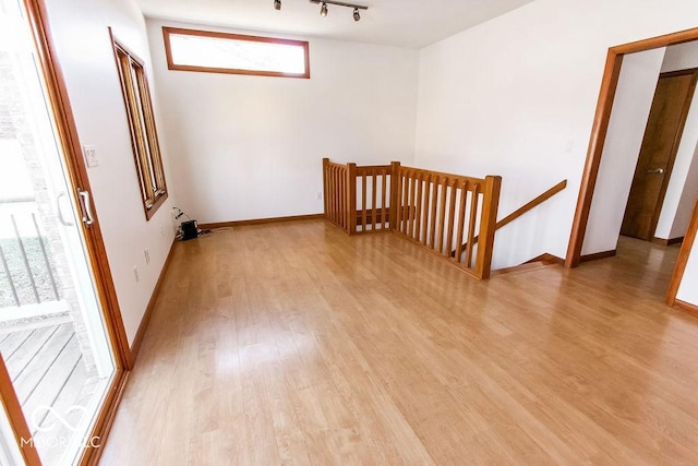 3948 S Woodfield Dr, New Palestine, IN 46163 - unfurnished room featuring light wood-type flooring and baseboards