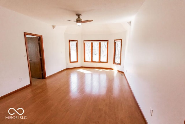 3948 S Woodfield Dr, New Palestine, IN 46163 - spare room with a ceiling fan and wood finished floors