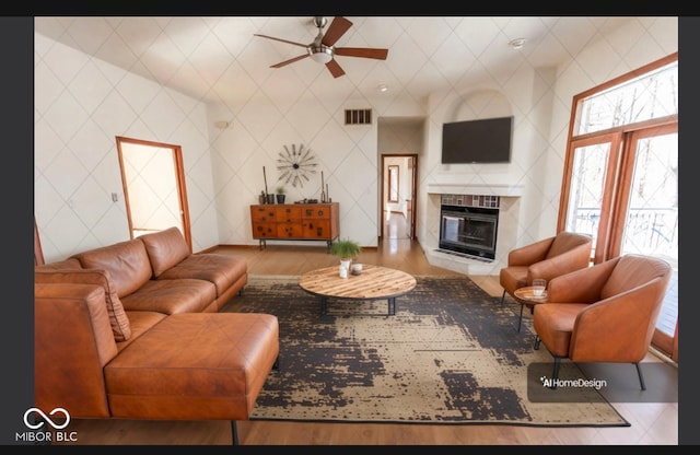 3948 S Woodfield Dr, New Palestine, IN 46163 - living room with ceiling fan and a tiled fireplace