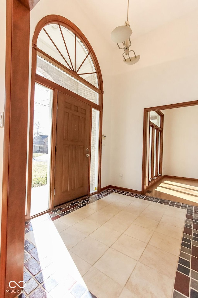 3948 S Woodfield Dr, New Palestine, IN 46163 - tiled foyer entrance with baseboards