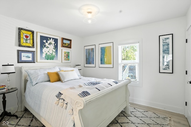 5312 Norwaldo Ave, Indianapolis, IN 46220 - bedroom featuring light wood-style floors and baseboards