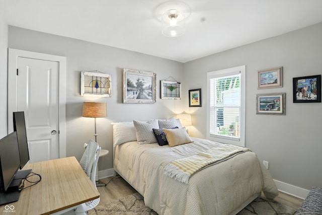 5312 Norwaldo Ave, Indianapolis, IN 46220 - bedroom featuring wood finished floors and an office area
