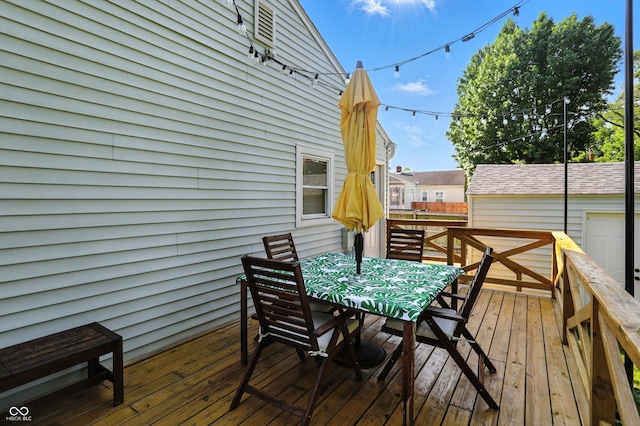 5312 Norwaldo Ave, Indianapolis, IN 46220 - wooden deck with outdoor dining space