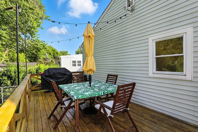5312 Norwaldo Ave, Indianapolis, IN 46220 - wooden terrace featuring outdoor dining space and a grill