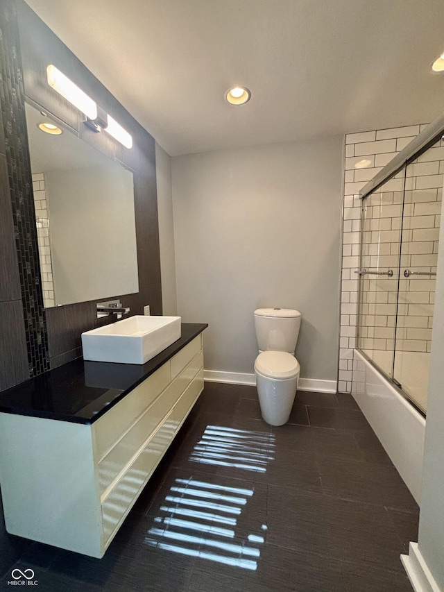 1738 E 71st St, Indianapolis, IN 46220 - full bath featuring vanity, shower / bath combination with glass door, and recessed lighting