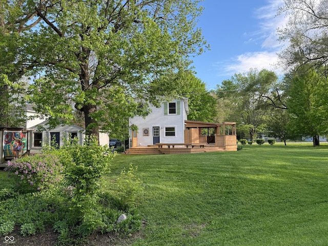 1738 E 71st St, Indianapolis, IN 46220 - back of property with a deck and a yard
