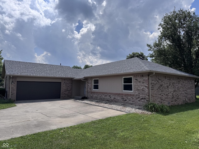 1206 Brownswood Dr, Brownsburg, IN 46112 - ranch-style home featuring brick siding, a front lawn, and an attached garage