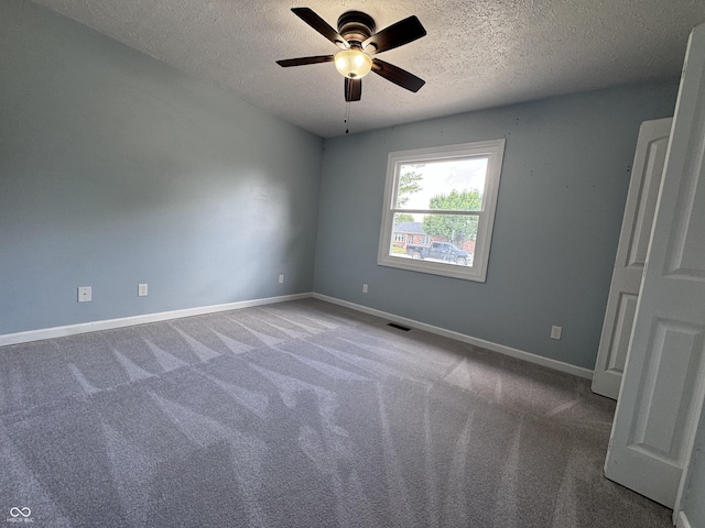 1206 Brownswood Dr, Brownsburg, IN 46112 - empty room featuring a textured ceiling, ceiling fan, and carpet