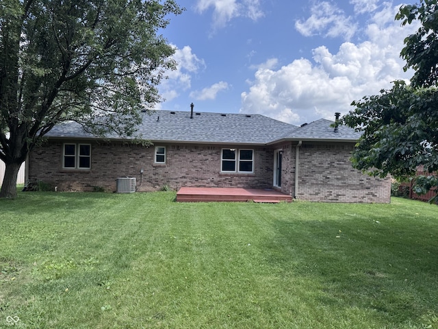 1206 Brownswood Dr, Brownsburg, IN 46112 - rear view of property featuring brick siding, a wooden deck, a yard, and a shingled roof