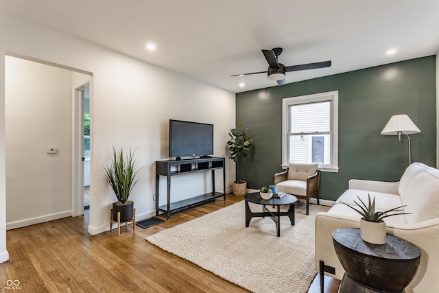 1710 N Irvington Ave, Indianapolis, IN 46218 - living room featuring wood finished floors, ceiling fan, and recessed lighting