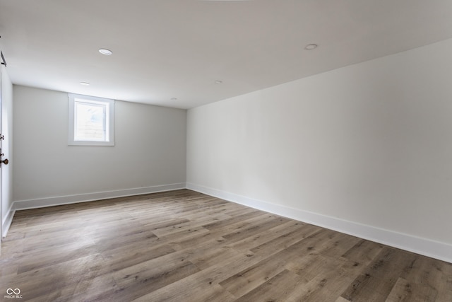 1710 N Irvington Ave, Indianapolis, IN 46218 - empty room featuring light wood finished floors and recessed lighting