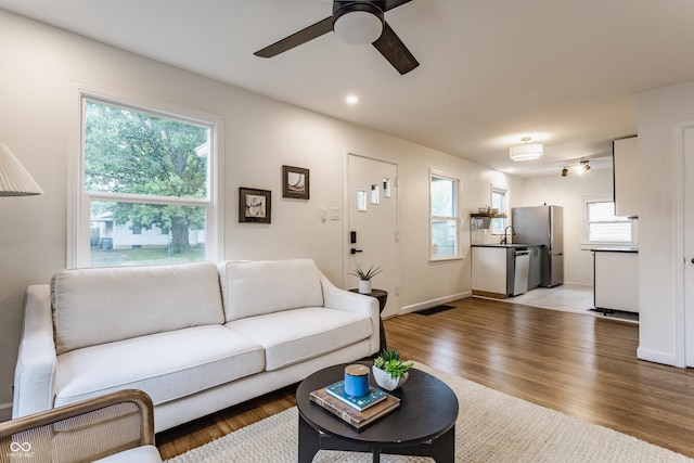 1710 N Irvington Ave, Indianapolis, IN 46218 - living area featuring plenty of natural light, a ceiling fan, light wood-type flooring, and recessed lighting