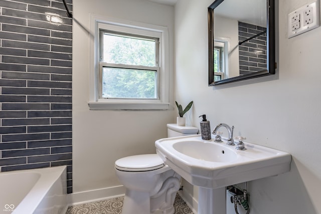 1710 N Irvington Ave, Indianapolis, IN 46218 - full bathroom with tile patterned floors and shower / bathtub combination
