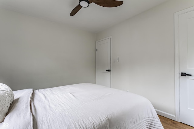 1710 N Irvington Ave, Indianapolis, IN 46218 - bedroom featuring wood finished floors and a ceiling fan