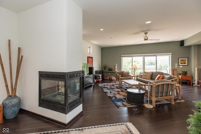 1036 Jackson St, Columbus, IN 47201 - living room featuring wood finished floors, a ceiling fan, and recessed lighting
