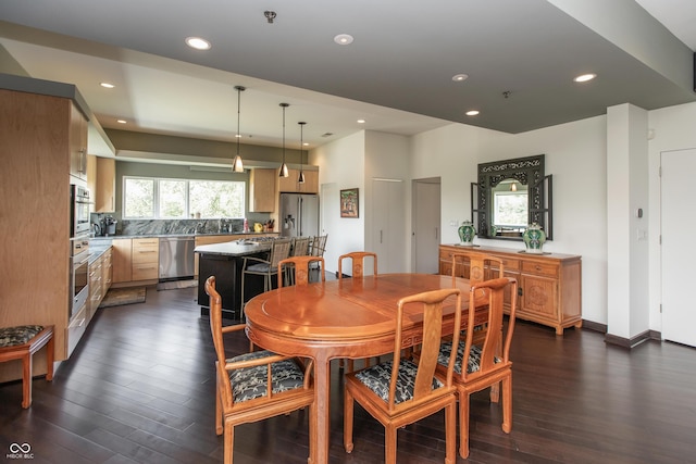 1036 Jackson St, Columbus, IN 47201 - dining area with dark wood-style floors and recessed lighting