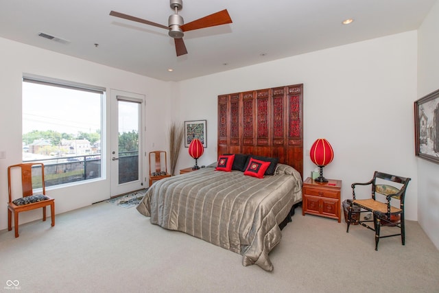 1036 Jackson St, Columbus, IN 47201 - carpeted bedroom featuring access to outside, recessed lighting, and ceiling fan