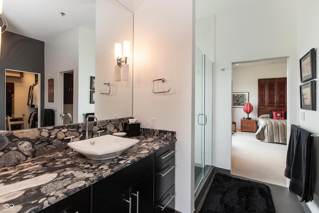 1036 Jackson St, Columbus, IN 47201 - ensuite bathroom with vanity, a high ceiling, and a stall shower