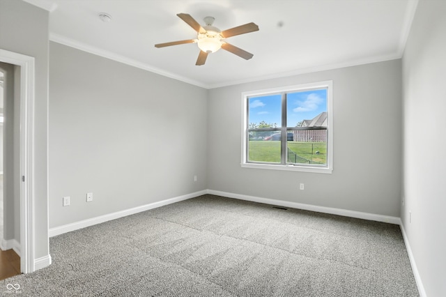 1127 Kay Dr, Greenwood, IN 46142 - unfurnished room featuring carpet, ceiling fan, and crown molding